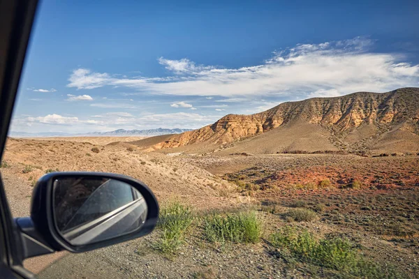 Desert canyons from inside of car — Stock Photo, Image