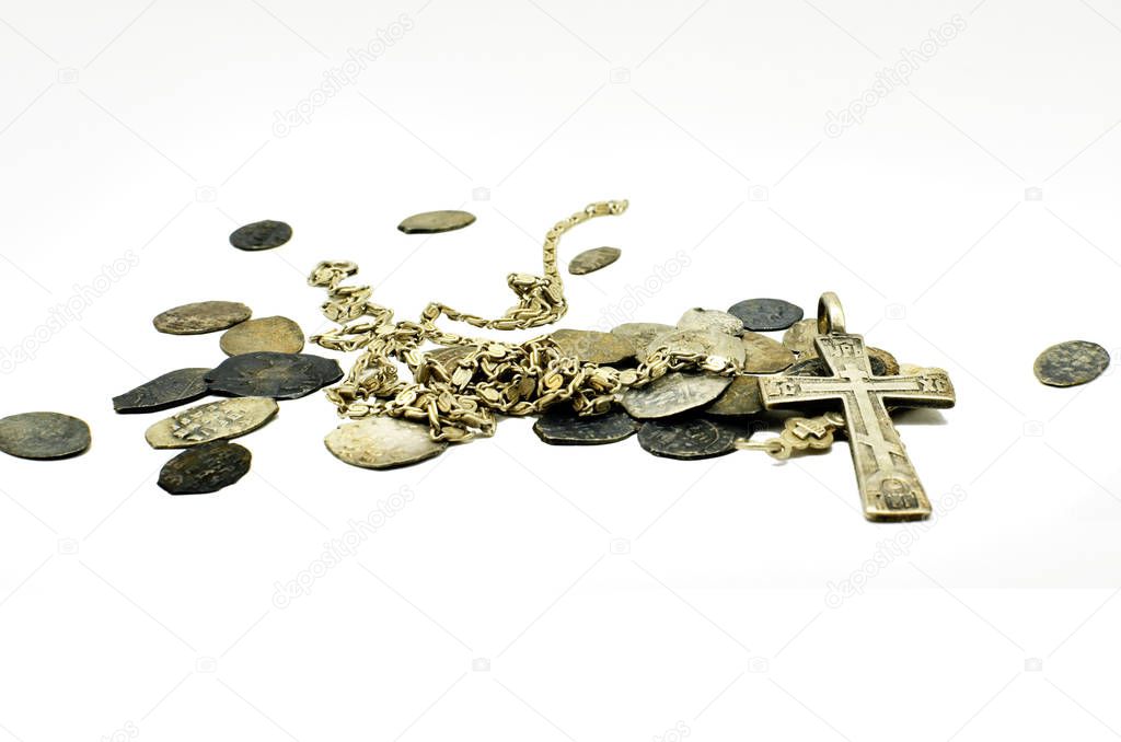 silver coins. coins of past centuries. coins made of silver wire. coins on a white background. coin scales