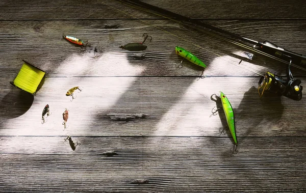 Fishing tackle on wooden background — Stock Photo, Image