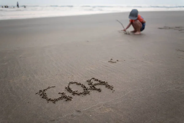 Beach in Goa, India - finger writing — Stock Photo, Image