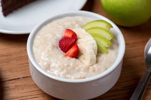 Oatmeal lifestyle on wood background — Stock Photo, Image