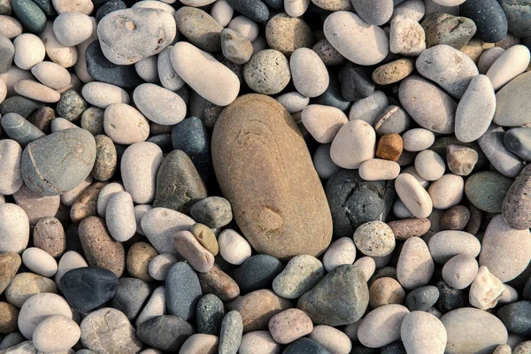 Beach stenen achtergrond. bovenaanzicht. — Stockfoto