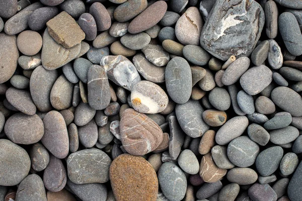 Pláž pozadí kameny. pohled shora — Stock fotografie