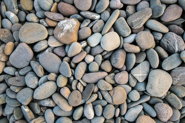Piedras de playa de fondo. vista superior —  Fotos de Stock