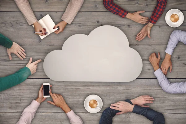 Teamwork concept - top view Group of People and Cloud Symbol on wooden table. — Stock Photo, Image