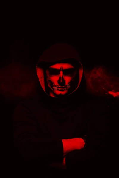 Evil man on black background — Stock Photo, Image