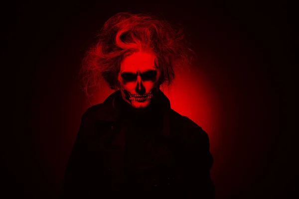 Evil man on black background — Stock Photo, Image