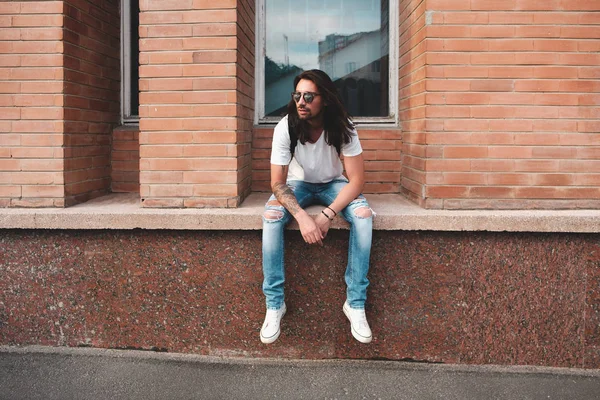 Hipster model with long hair Royalty Free Stock Images