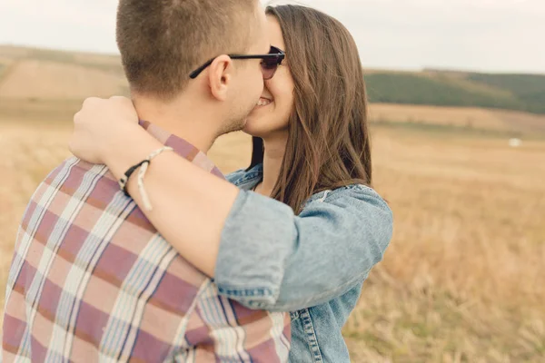 Young modern stylish couple outdoors — Stock Photo, Image