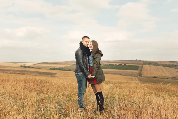 Young modern stylish couple outdoors — Stock Photo, Image