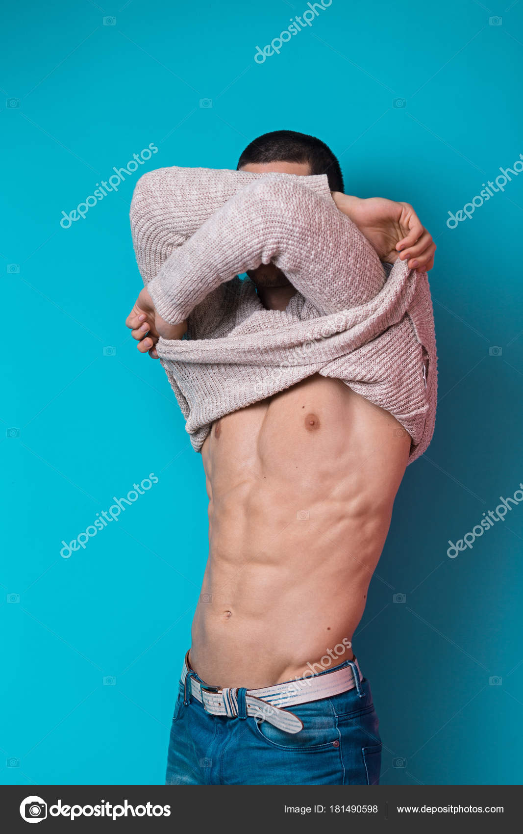 Man taking off his clothes Stock Photo by ©arthurhidden 181490598