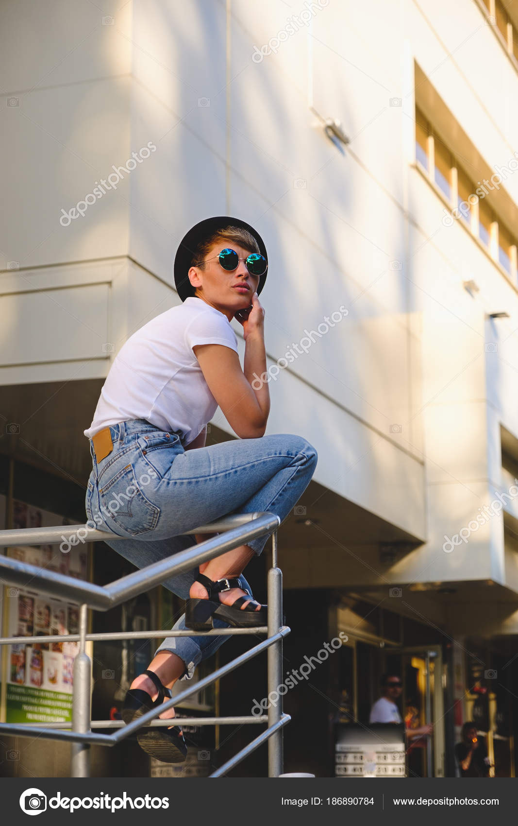 Modern woman portrait wearing stylish round glasses hanging out Stock Photo  by ©arthurhidden 186890784