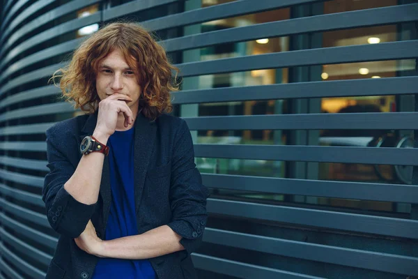 Portrait of red haired man over urban futuristic background — Stock Photo, Image