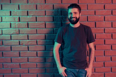 Cheerful young man in a nightclub