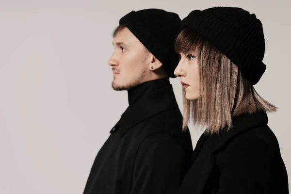 Millennial fashion couple on a white background in studio — Stock Photo, Image