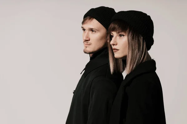 Millennial fashion couple on a white background in studio — Stock Photo, Image