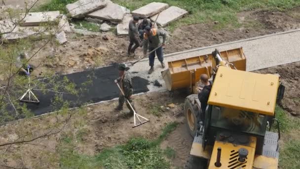 Mtsensk, Russia 23 May 2017. EDITORIAL - Laying of asphalt in the pedestrian zone. — Stock Video