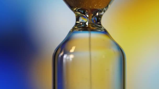 Hourglass. Super Close-up View of Sand Flowing Through an Hourglass. — Stock Video