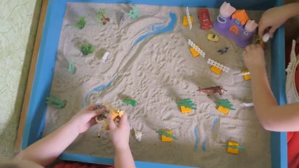 Childrens sand therapy. Childrens games with sand. Educational activities in the game room. — Wideo stockowe