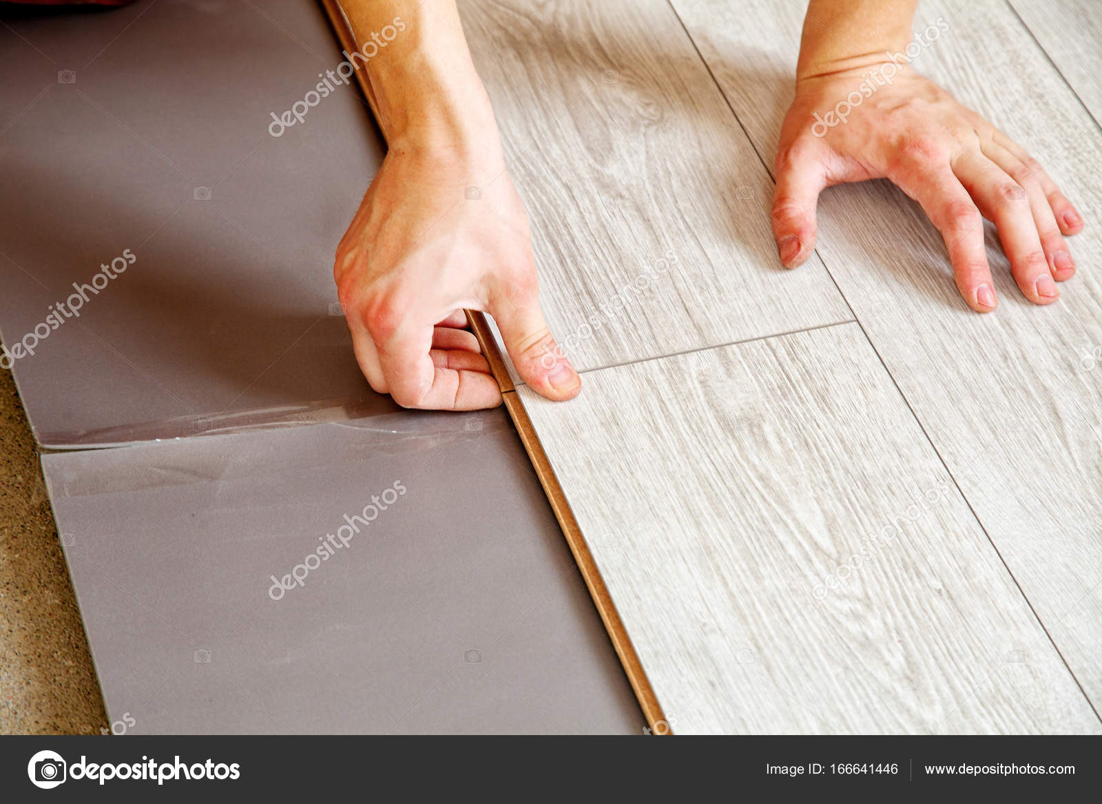 Handyman S Hands Laying Down Laminate Flooring Boards Stock