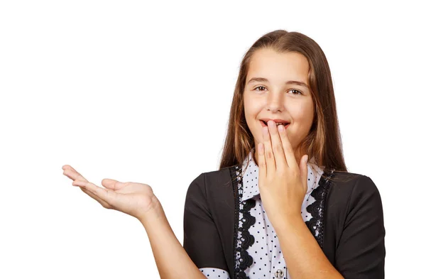 Sorprendido adolescente chica mostrando un producto —  Fotos de Stock