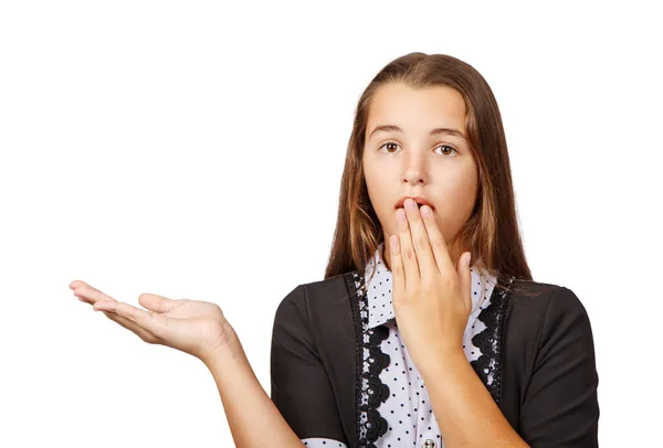 Surprised teen girl showing a product — Stock Photo, Image