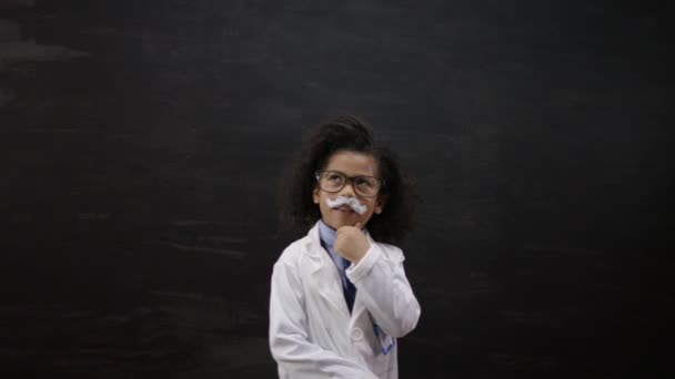 Scientist standing near on blackboard — Stock video