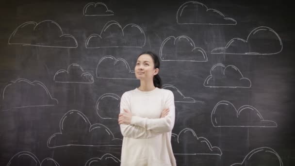 Woman  standing in front of blackboard — Stock Video