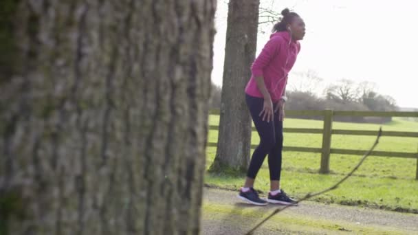 Woman stops to get her breath back — Stock video