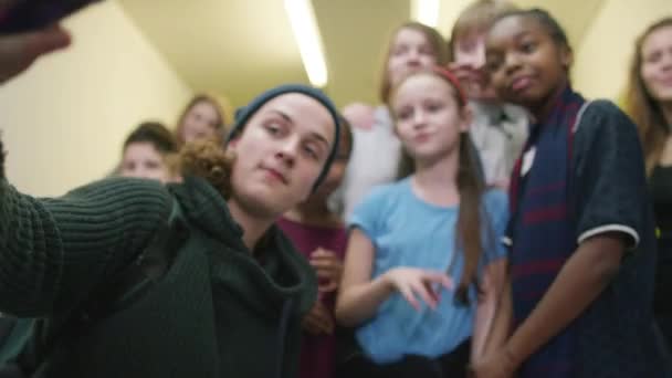 Pupils pose for selfie in school — Stock Video