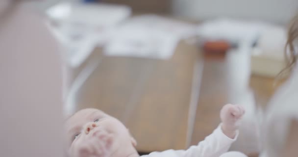 Mother with friend holding baby — Stock Video