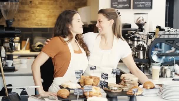 Smiling worker standing behind counter — Stock Video