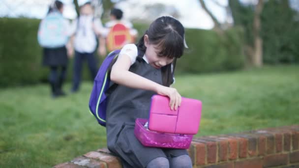 Girl cheers up when children come to play — Stock Video