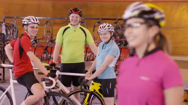 Cyclists standing beside the track — Stock Video