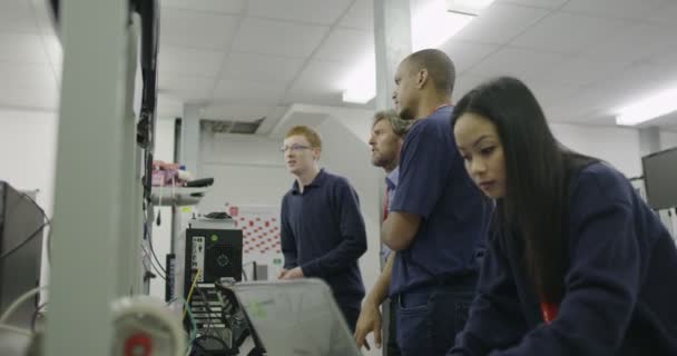 Workers working on computer testing — Stock Video