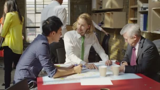 Business men in strategy meeting — стоковое видео