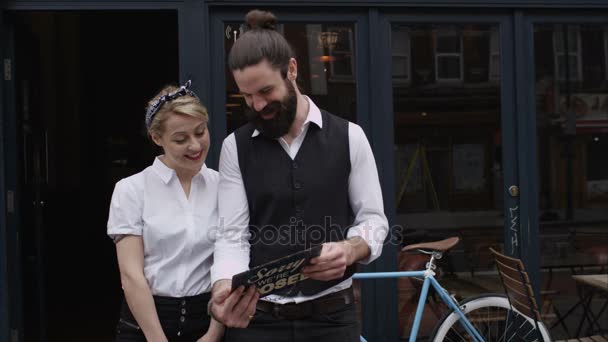 Smiling Bar Cafe Owners Holding Sign Show Open Business — Stock Video