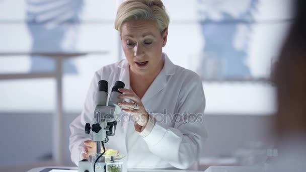 Female Medical Researcher Working Lab Analyzing Samples — Stock Video