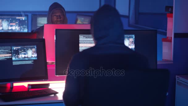 Computer Hacker Working Dark Room Surrounded Computer Screens — Stock Video