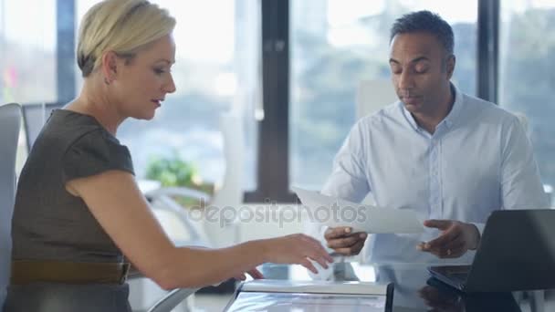 Business Man Woman Meeting Looking Printed Graphs Discussing — Stock Video