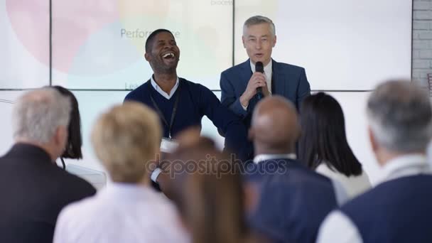 Audience Listening Confident Speakers Giving Motivational Presentation — Stock Video