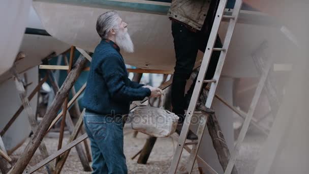 Boatyard Carpenters Checking Boats Which Have Been Renovated Newly Built — Stock Video