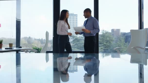 Business Man Woman Discussing Paperwork Front Large Office Window — Stock Video