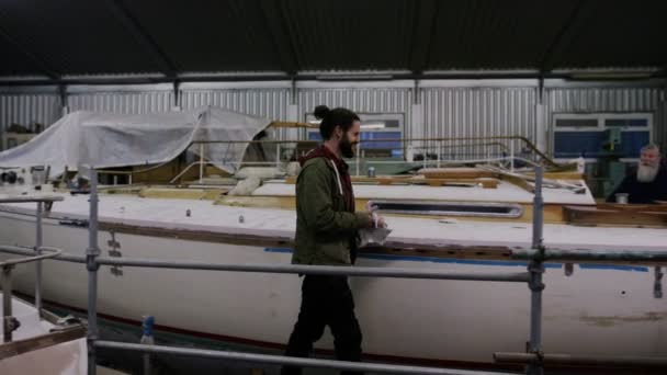 Father Son Boatyard Building Renovating Sailing Boat Family Business — Stock Video