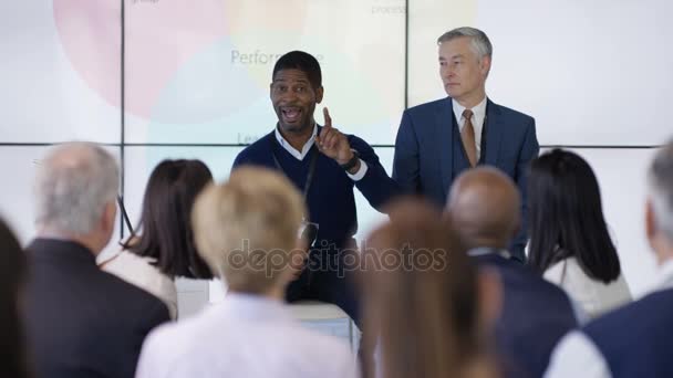 Audience Listening Confident Speakers Giving Motivational Presentation — Stock Video