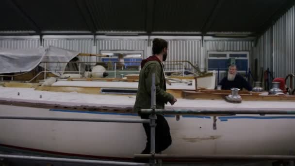 Father Son Boatyard Building Renovating Sailing Boat Family Business — Stock Video