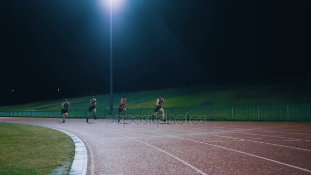 Atletas Masculinos Competitivos Corriendo Juntos Pista Carreras — Vídeos de Stock