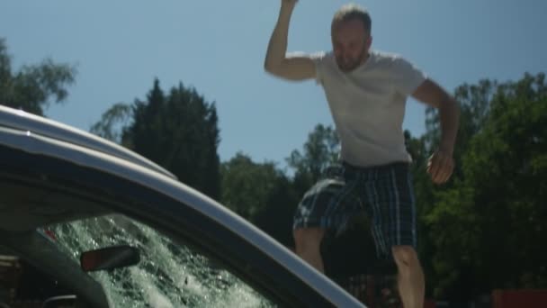 Aggressive Man Anger Issues Smashing Car Baseball Bat — Stock Video