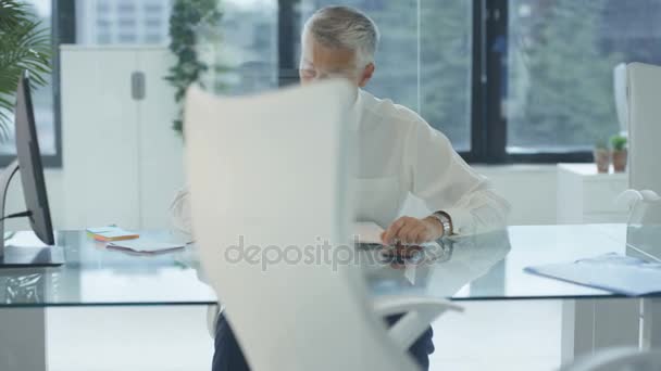 Attractive Mature Businessman Working His Desk City Office — Stock Video