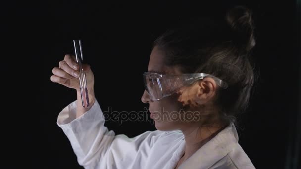 Scientist Looking Test Tube Scenes War Projected Her Face — Stock Video